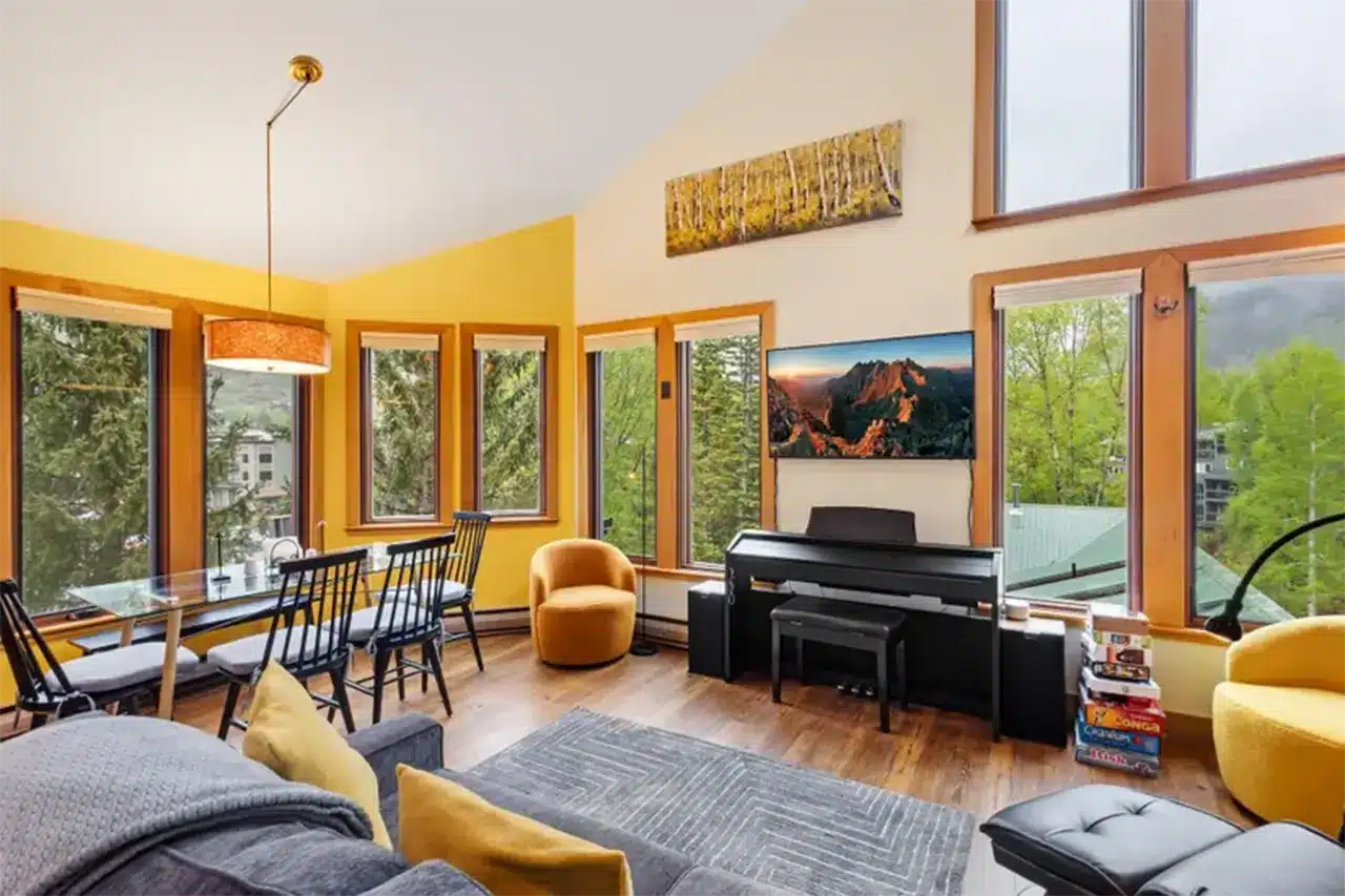 Shimkonis Partners Telluride real estate listing, 333 S Fir Street, Telluride bright interior living space with verdant summer views