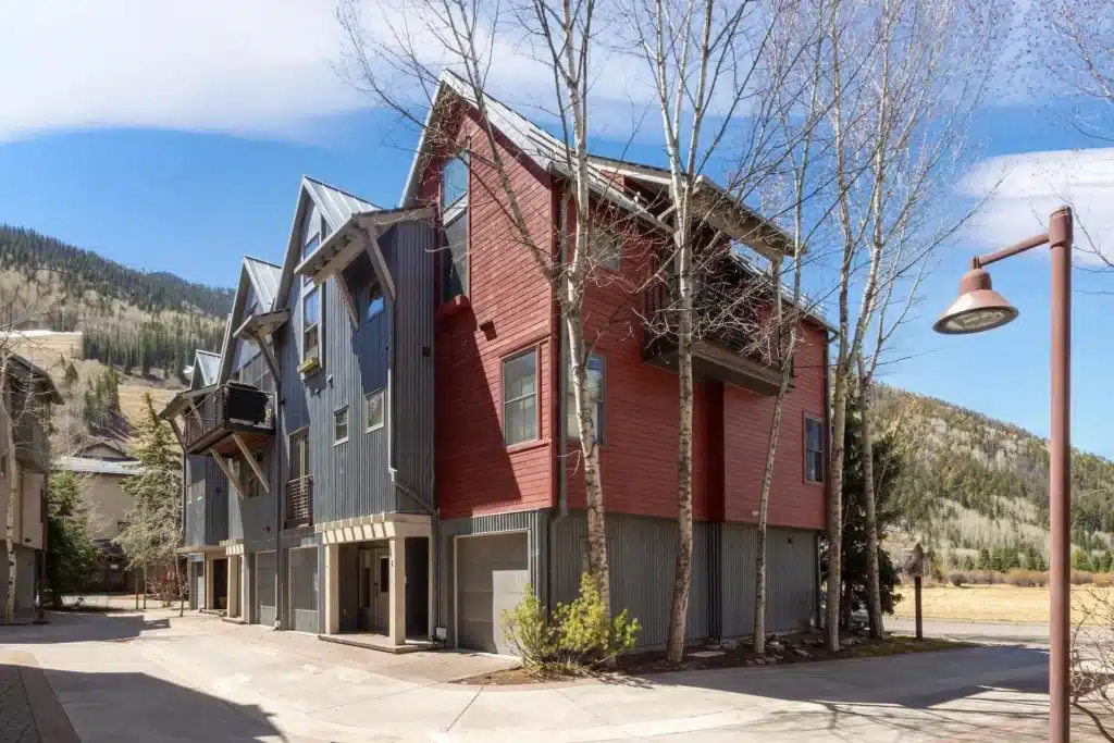 Shimkonis Partners real estate listing, 240 Mahoney Drive, Telluride, sunny, spring exterior building view