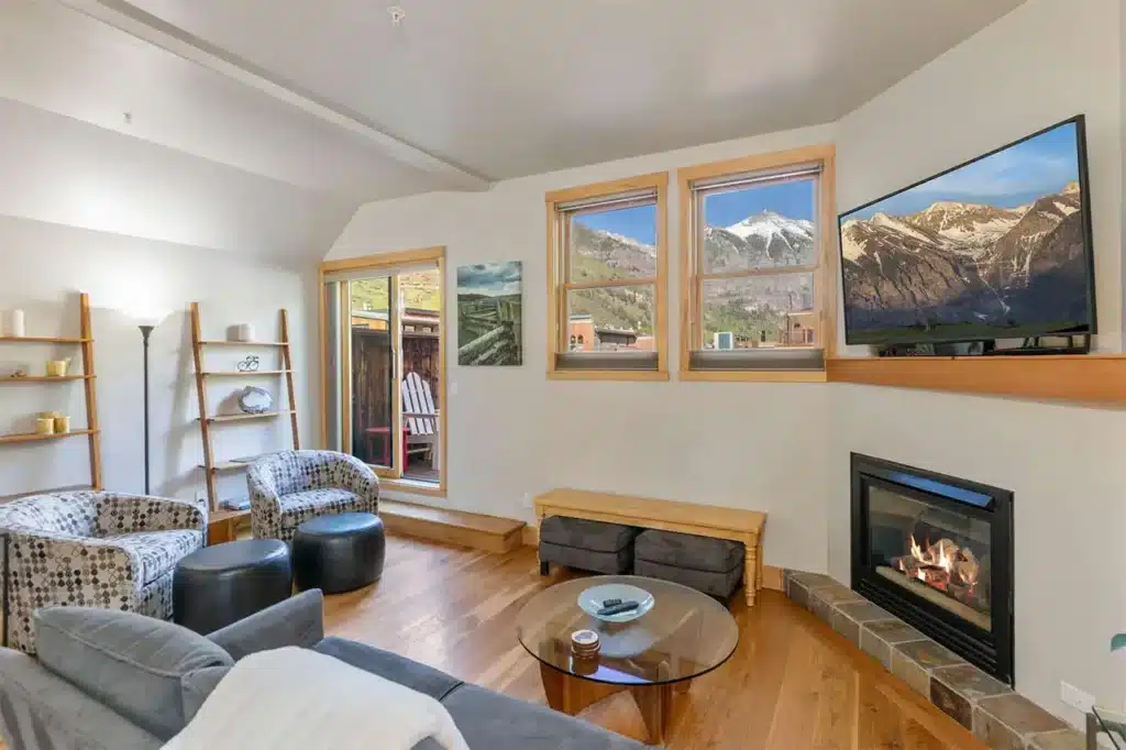 Shimkonis Partners real estate listing, 110 S Pine St, Telluride, bright, open living, area with spring mountain views