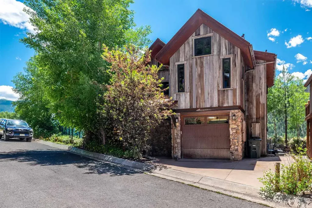 Shimkonis Partners Telluride real estate listing, 210 S Sunset Ridge, verdant, summer exterior view
