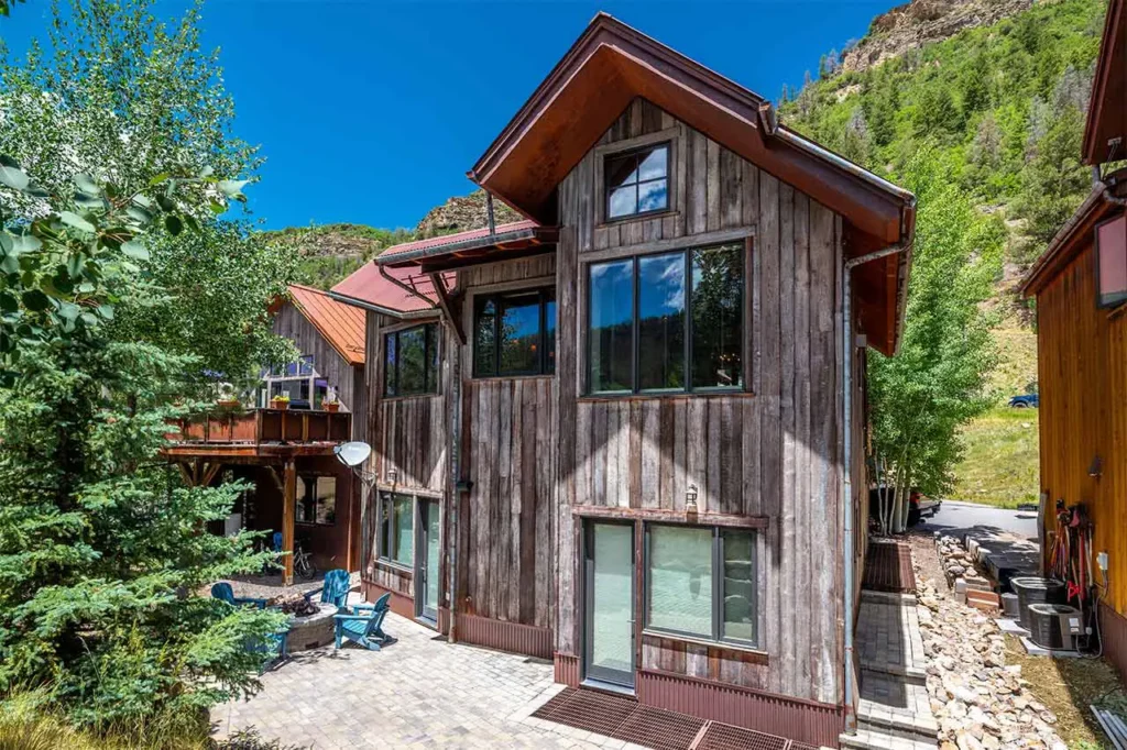 Shimkonis Partners Telluride real estate listing, 210 S Sunset Ridge, verdant, summer exterior view