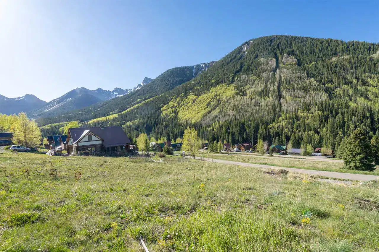 Spring view of Shimkonis Partners Telluride area real estate listing, TBD Porphyry Street, Ophir, mountain views