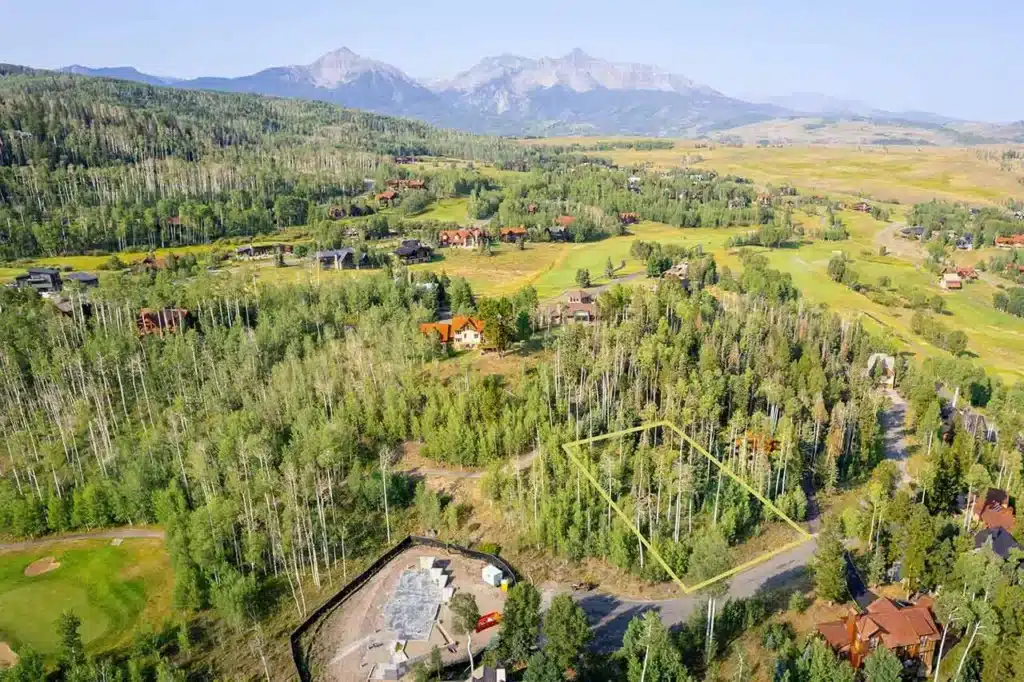 Summer aerial view Shimkonis Partners Telluride real estate listing, TBD Birdie Drive, Mountain Village